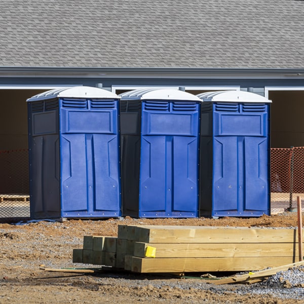 what is the maximum capacity for a single portable toilet in Keota